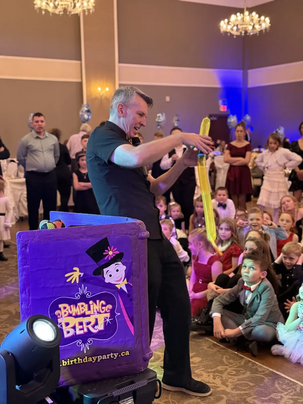 A Presswood magician entertaining a group